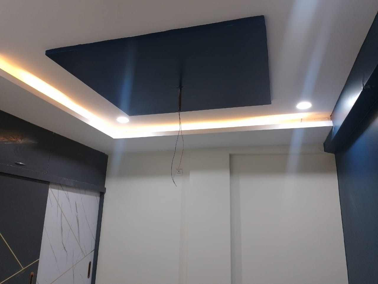 Two-tone tray ceiling with LED cove in Vizag